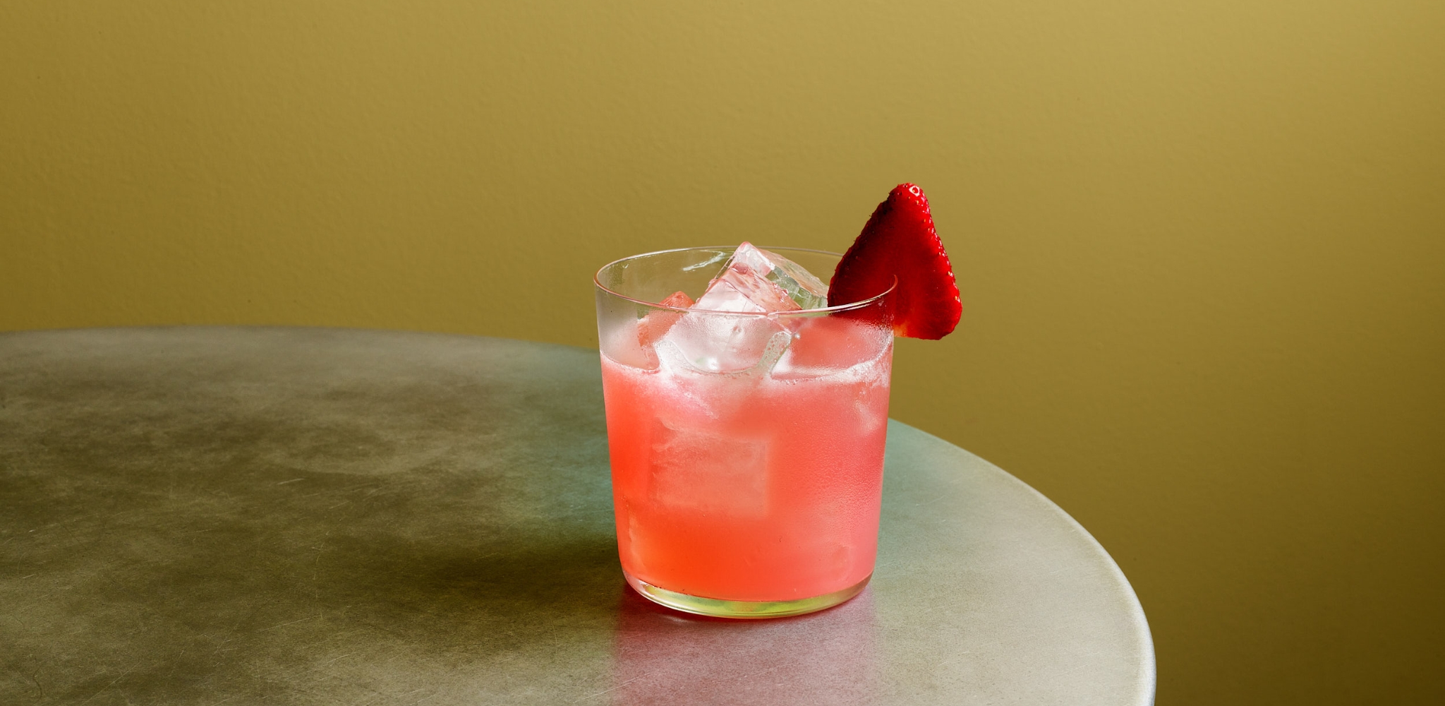 Image of the Jacksons Margarita with Casamigos Blanco, Cointreau, strawberry gum, fresh lime and fresh strawberry.