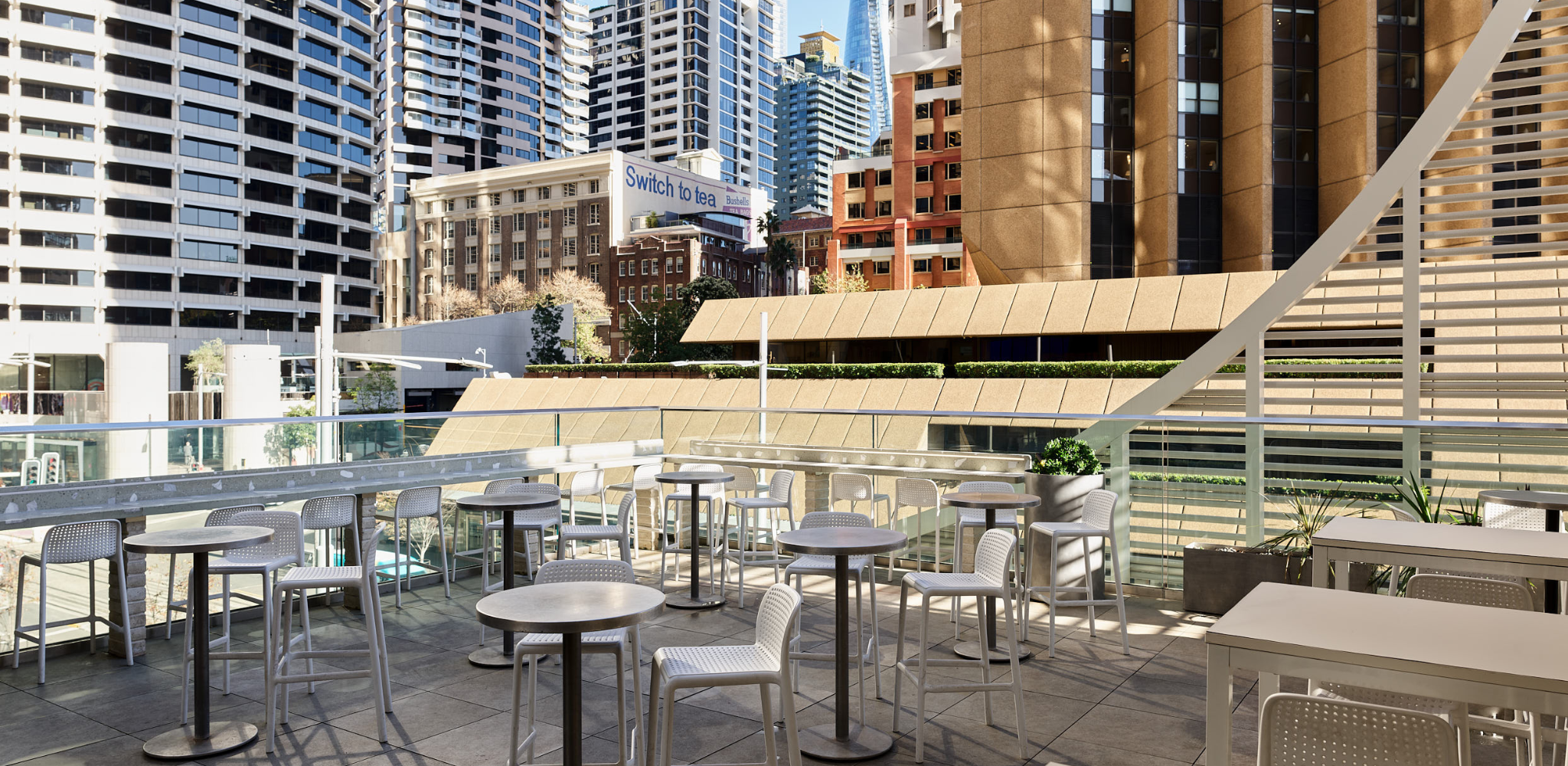 Rooftop event space facing city skyline views ideal for cocktail style events